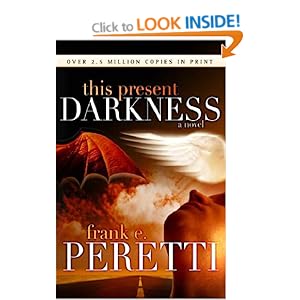 This Present Darkness: Amazon.co.uk: Frank Peretti: Books