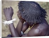 Canvas Prints of An unusual braided hairstyle of a Dassanech young man from AWL Discover Images