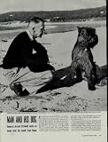 MAN AND HIS DOG: General Stilwell, who says his household rank is 