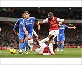 Photographic Prints of Alex Song scores Arsenals 1st goal under pressure from Branislav Ivanovic from Arsenal FC Prints
