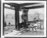 Photo Reprint Porch with wicker furniture, and view over lawn to home of Edmund Cogswell Converse, Greenwich,