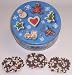 Scott's Cakes 1 lb. Milk Chocolate Covered Pretzel with Chocolate Chips & White Chocolate Chips in a Christmas Cookie Tin
