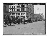 Newswire Photo (L): 1st Battery, in carts and on horse-back, going to war game, New York