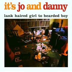 Lank haired girl to bearded boy