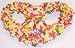 Scott's Cakes White Chocolate Covered Pretzels with Rainbow Jimmies in a 1/2 lb. White Gourmet Box