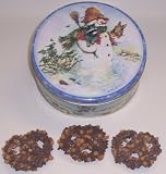 Scott's Cakes 1 lb. Milk Chocolate Covered Pretzel with Chocolate Chips & Peanut Butter Chips in a Classic Snowman Tin