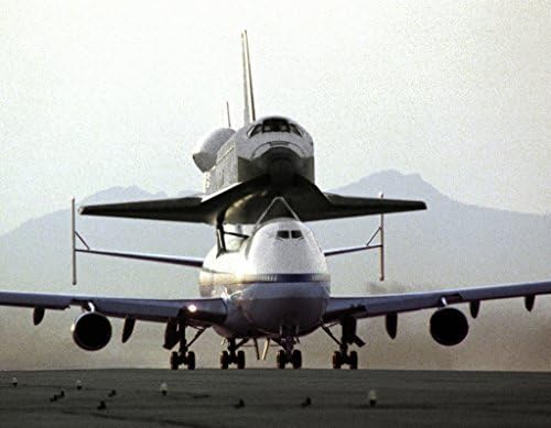 POSTER A3 NASA Endeavour is Delivered to the Kennedy Space Center NASAs 747 Shuttle Carrier Aircraft No. 911 with the space shuttle orbiter Endeavour securely mounted atop its fuselage taxies to th