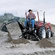 - PACKAGE - 25 HP NorTrac Tractor with Ag Tires, Front End Loader and Backhoe