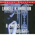 A Caress of Twilight (Meredith Gentry, Book 2) by Laurell K. Hamilton and Laural Merlington