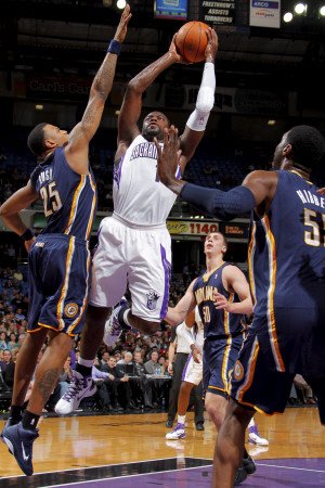 Indiana Pacers v Sacramento Kings: Tyreke Evans and Brandon Rush Photographic Poster Print by Rocky Widner, 28x42