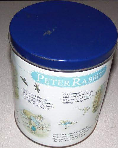 Peter Rabbit Jigsaw Puzzle - 12" x 34", 700 Pieces with decorative round tin.