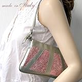 子ヤギ革の柔らかいこなれた雰囲気のバッグ。レザーのカッティングが美しい大人の気品溢れるバッグ。