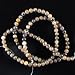 4mm chiastolite round beads 16" strand