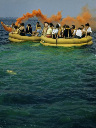 Flight Attendants Wearing Life Vests Take Part in a Life Raft Drill Photographic Poster Print by B. Anthony Stewart, 18x24