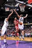Houston Rockets v Sacramento Kings: Aaron Brooks and Carl Landry Photographic Poster Print by Rocky Widner, 24x36