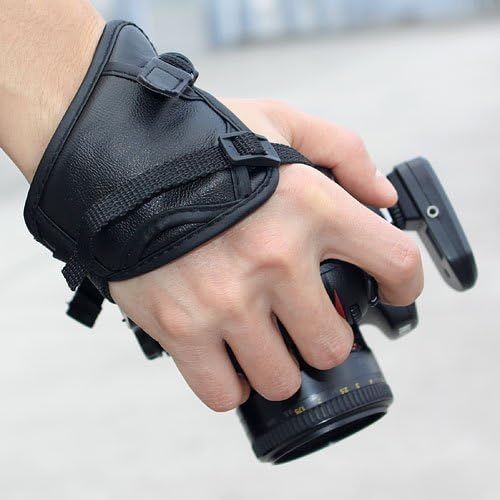 Okeba Professional Hand/Wrist Strap Grip for SLR/DSLR, camcorders and full size digital cameras (SONY A100, A200, A300, A350, A700, NIKON D, CANON EOS, PENTAX K, SAMSUNG GX, OLYMPUS E Cameras And so on)-Black+ One Cool Skull Key Chain Charm Strap At Random Color