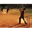 Cricket Batsman Swings On Dusty Pitch, Fort Cochin, India Artists Photographic Poster Print By Anthony Plummer, 36x48
