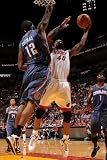 Charlotte Bobcats v Miami Heat: Udonis Haslem Photographic Poster Print by Andrew Bernstein, 24x36