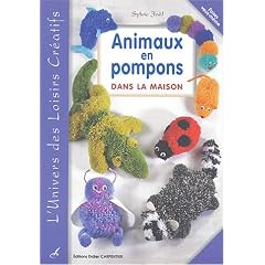 Animaux en pompons dans la maison