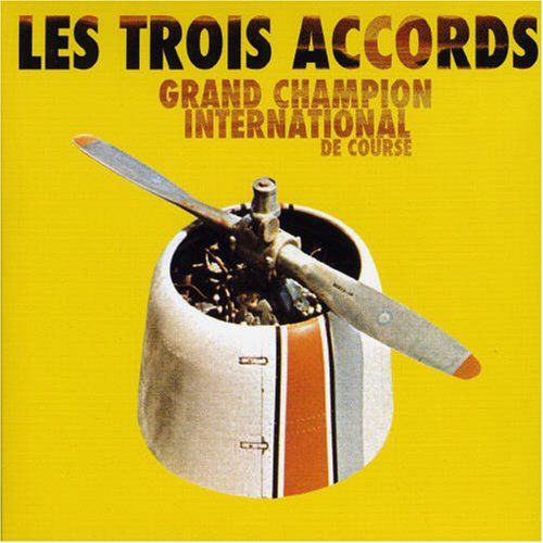Les Trois Accords - Grand Champion International - Zortam Music