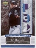 2007 Upper Deck Premier Patches Triple #RO - Roy Halladay - Toronto Blue Jays - Serial #d 28/66 - Game Used Jersey Swatch