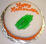 Carrot Decorated Cake Single Layer 8 Round Topped with Gummie Witch Hand Orange Trim