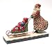 Santa Claus Skating with Baby in Sleigh Figurine