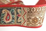 Patchwork style all Indian jacquards and embroideries border; made of 5 different patterns as patchwork. Stunning shades of red. One section has Indian embroidery with stones, crystals and old gold beads.Pictures says it all!. This one is 6 cms deep; STUNNING is the only word to describe this unique embroidery it has a selvedge edge in a matting plain red cotton binding. Sold by meter