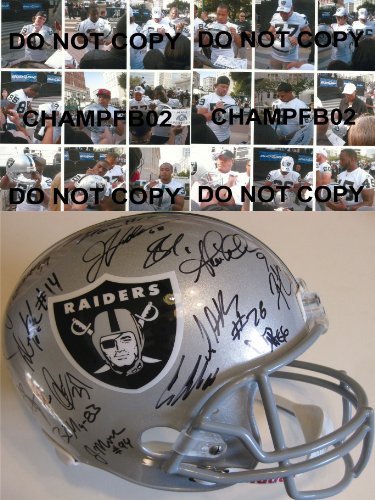 2011 OAKLAND RAIDERS TEAM,SIGNED,AUTOGRAPHED,RIDDELL FULL SIZE HELMET WITH PROOF + COA,CARSON PALMER PLUS MORE