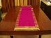 Pink Sari tablerunner with golden trim / tassels