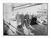 Newswire Photo (L): Peary party on boat deck: Geo. Clark, John Clark (chief officer),...