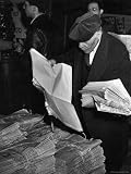 News Vendor Sorting Through Bundles of the "Jewish Daily Forward" Photographic Poster Print by Hansel Mieth, 12x16