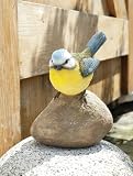 BLUE TIT ON A STONE GARDEN ANIMAL ORNAMENT