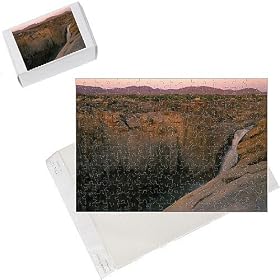 Photo Jigsaw Puzzle of Augrabis Falls - orange river cascading down deep canyon from Ardea Wildlife Pets