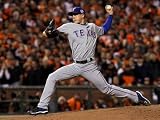 Texas Rangers v San Francisco Giants, Game 2: Derek Holland Photographic Poster Print by Justin Sullivan, 12x16