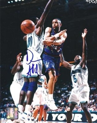 Damon Stoudamire Autographed Toronto Raptors 8x10 Photo