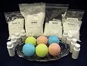 Complete Bath Bomb Starter Kit, 2 lbs. Baking Soda, 1 Lb. Citric, 1 lb. Corn Starch, 1 lb. Epsom Salt, 4 x 1 oz. fragrances, 4 x 1 oz. FD&C = Strawberry Red, Lemon Yellow, Sky Blue, Mint Green.