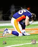 Tim Tebow - kneeling after 2011 AFC Wild Card Playoff victory NFL 8x10 Photo