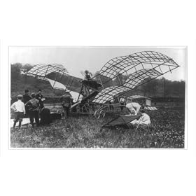 Historic Print (XL): John Kowalski, a marine engine maker, [with others], and his airplane which got off the