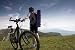 Young Lady Cycling in the Mountains - 60W x 40H - Peel and Stick Wall Decal by Wallmonkeys