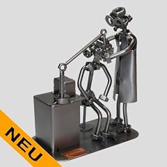 SCHRAUBENM�NNCHEN Augenarzt Optiker mit Patient