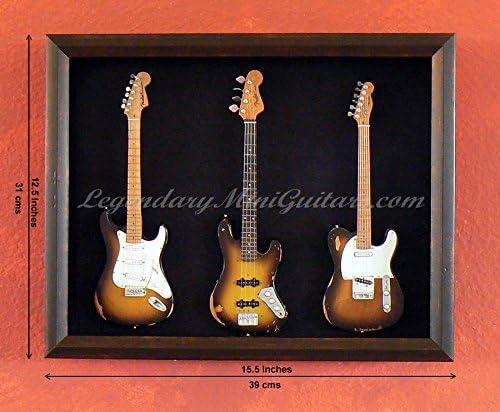 Three Distressed Miniature Fenders Guitars in Shadow Box