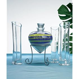 Heart Shaped Sand Ceremony Vase Set. It is a popular alternative to the Unity Candle Ceremony today. Creates a tangible keepsake of the Bride and Groom's life blending together to become one. By adding a third vase you are able incorporate your priest, child or have the third vase represent your shared spiritual beliefs. Sand Sold Separately