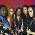 Imani Winds (wind quintet) by Monica Ellis, Mariam Adam, Valerie Coleman, Mario Lavista, and Astor Piazzolla