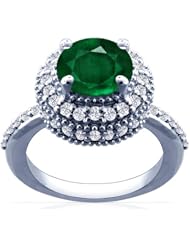 Platinum Round Cut Emerald Ring With Sidestones