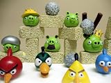 Angry Birds Deluxe 27 Piece Birthday Party Cake Topper Set with Buildable Game Scene Display Consisting of Boulders, Building Blocks, Slingshot and 12 Angry Bird Figures and Pesky Pigs