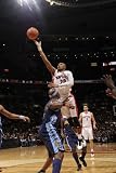 Denver Nuggets v Toronto Raptors: Leandro Barbosa and Al Harrington Photographic Poster Print by Ron Turenne, 12x18