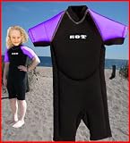 (Approx age 10Yr) Purple Childrens shortie wetsuit. 2mm neoprene with HOT motif. Great UV protection.