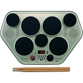 Yamaha DD55c, Digital Drums, 7 touch sensitive pads, 2 pedals, 45 programmed drum kits, 100 songs, effects, built in recorder, learning system, includes drumsticks and adaptor
