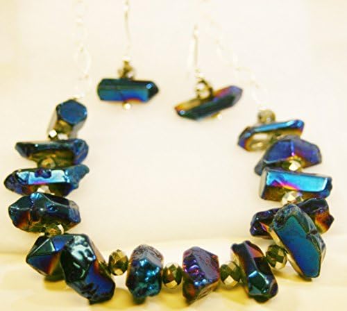 Necklace of Titanium coated Quartz stick Beads with Silver colored faceted Czech fire polished oval beads